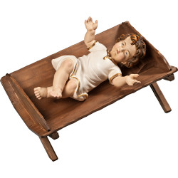 Niño Jesús vestido en cuna simple